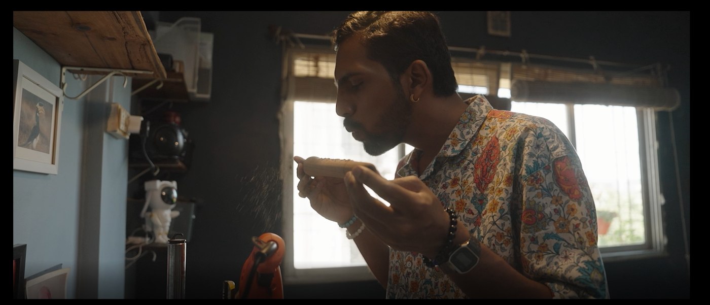 Omkar Dhumal testing a hand-crafted Shehnai
